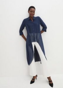 Bluzka szyfonowa z falbanami. Niebieskie bluzki bonprix, bez wzorów, z szyfonu, eleganckie, bez kołnierzyka, bez ramiączek. Za 119,99 zł.