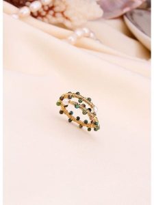 L'Atelier de Gaia Pozłacany pierścionek z perłami i cyrkoniami rozmiar: onesize. Białe pierścionki L'Atelier de Gaia, z cyrkonią, pozłacane. Za 30,99 zł.