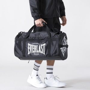 ICONIC WIELKA TORBA SPORTOWA CZARNY POLIESTER. Czarne torby podróżne i sportowe EVERLAST, bez wzorów, z poliesteru, duże. Za 263,00 zł.
