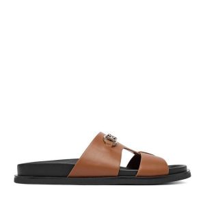Klapki Nine West. Brązowe klapki Nine West, bez wzorów, bez obcasa. Za 169,99 zł.