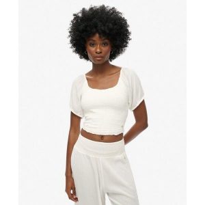 Bluzka t-shirt z marszczeniem dla kobiet Superdry. Białe t-shirty Superdry, bez wzorów, bez kołnierzyka, bez ramiączek. W wyprzedaży za 138,15 zł.