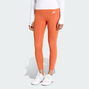 Legginsy 7/8 bez szwu z przodu Optime Essentials. Brązowe legginsy ADIDAS, bez wzorów. Za 219,00 zł.