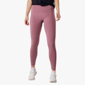 Długie legginsy treningowe damskie Swedemount Core Wrap szybkoschnące. Fioletowe legginsy SWEDEMOUNT, bez wzorów, z tkaniny, długie. Za 125,00 zł.