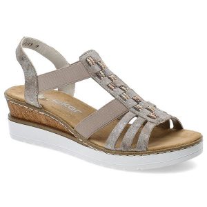 Srebrne Sandały Rieker Eleganckie Obuwie Damskie Na Koturnie. Szare sandały Rieker, bez wzorów, bez obcasa, na koturnie, bez zapięcia. Za 239,00 zł.