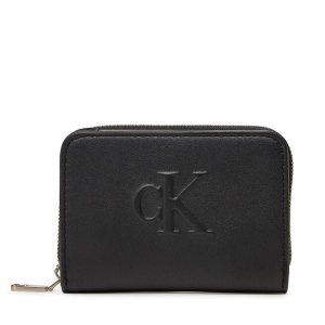 Portfel Calvin Klein Jeans. Czarne portfele Calvin Klein Jeans, bez wzorów, z jeansu. Za 149,99 zł.