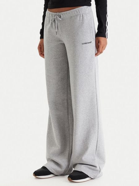 Guess Jeans Spodnie dresowe W6RB52 K68I4 Szary Regular Fit. Szare spodnie dresowe Guess Jeans, l, z aplikacjami, z bawełny. Za 299,99 zł.