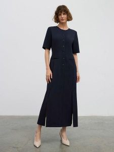 BGN Sukienka w kolorze granatowym rozmiar: 38. Niebieskie sukienki BGN, na imprezę, bez wzorów, bez kołnierzyka, bez ramiączek, maxi. Za 183,59 zł.