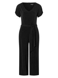 More & More Kombinezon w kolorze czarnym rozmiar: 42. Czarne kombinezony More & More, bez wzorów, z tkaniny, bez kołnierzyka, bez ramiączek. Za 165,99 zł.