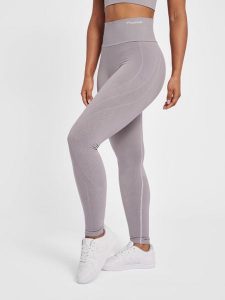 Legginsy damskie Hummel MT Flow. Fioletowe legginsy Hummel, bez wzorów, z dzianiny. Za 234,05 zł.