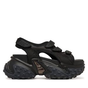 Sandały Buffalo. Czarne sandały Buffalo, bez wzorów, bez obcasa, na płaskiej podeszwie, bez zapięcia. Za 429,99 zł.