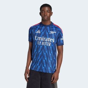 Koszulka piłkarska ADIDAS Arsenal sezon 25/26 wyjazdowa. Bluzki ADIDAS, l, bez wzorów, sportowe, bez kołnierzyka, bez ramiączek. Za 339,99 zł.