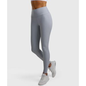 Legginsy sportowe damskie. Niebieskie legginsy NORDICDOTS, bez wzorów, z materiału, długie. Za 365,00 zł.