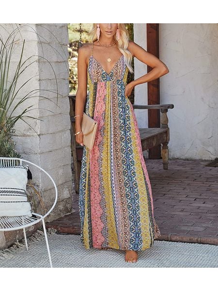 Milan Kiss Sukienka ze wzorem rozmiar: M. Sukienki Milan Kiss, m, bez wzorów, bez kołnierzyka, bez ramiączek, maxi, rozkloszowane. Za 114,44 zł.