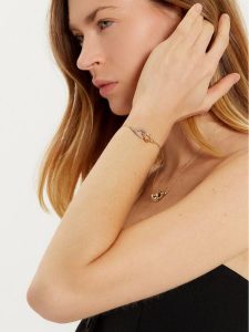 Tory Burch Naszyjnik Interlocking Wishbone Pendant 161070 Złoty. Żółte naszyjniki Tory Burch, metalowe. Za 539,99 zł.