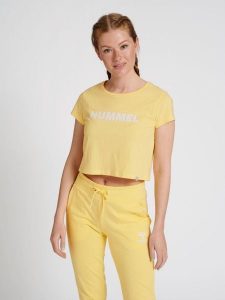 Damska koszulka crop top Hummel Legacy. Żółte topy Hummel, s, bez wzorów, z bawełny, klasyczne, bez kołnierzyka, bez ramiączek. Za 84,11 zł.