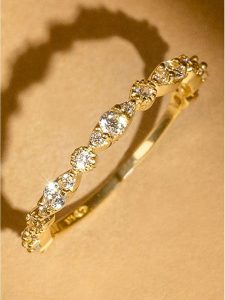 OR ÉCLAT Złoty pierścionek "Relation" z cyrkoniami rozmiar: 52. Żółte pierścionki OR ÉCLAT, z cyrkonią, złote. Za 695,99 zł.