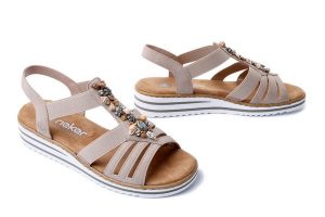 RIEKER V0649-62 beige, sandały damskie. Brązowe sandały Rieker, bez wzorów, bez obcasa, na koturnie, bez zapięcia. Za 223,93 zł.