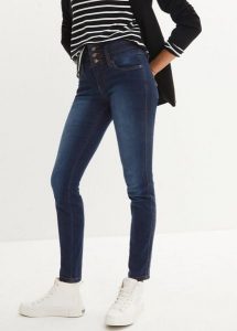 Modelujące jeansy o kroju slim fit, high waist. Niebieskie jeansy bonprix, bez wzorów, z jeansu, z podwyższonym stanem. Za 169,99 zł.