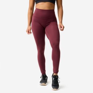 Legginsy fitness damskie Domyos. Fioletowe legginsy DOMYOS, bez wzorów, z elastanu. Za 129,99 zł.