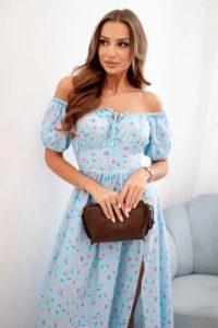 Sukienka damska maxi w kwiaty z bufkami niebieska. Niebieskie sukienki Kesi Włoski, na spacer, na lato, l, bez wzorów, z elastanu, wakacyjne, bez kołnierzyka, bez ramiączek, maxi, dopasowane. Za 196,55 zł.