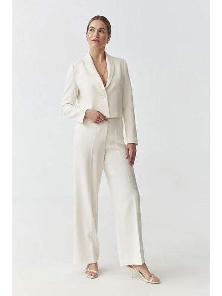 TATUUM Spodnie w kolorze kremowym rozmiar: 40. Brązowe spodnie z wysokim stanem Tatuum, bez wzorów, z materiału, z podwyższonym stanem. Za 196,24 zł.