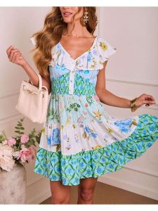 Milan Kiss Sukienka w kolorze turkusowo-kremowym rozmiar: XL. Białe sukienki Milan Kiss, na imprezę, xl, bez wzorów, bez kołnierzyka, bez ramiączek, mini. Za 194,95 zł.