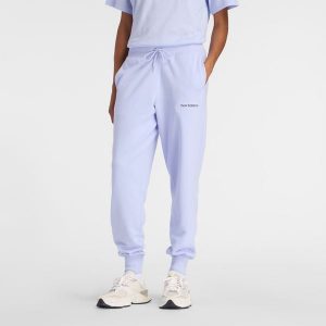 Spodnie damskie New Balance WB61D3EADYK – fioletowe. Fioletowe spodnie dresowe New Balance, m, bez wzorów, z bawełny. Za 259,99 zł.