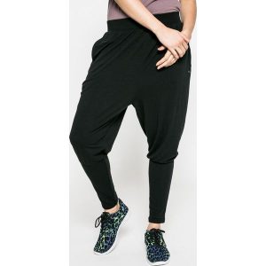 Puma - Spodnie Dancer Drapey. Spodnie dresowe marki Puma. W wyprzedaży za 119,90 zł.