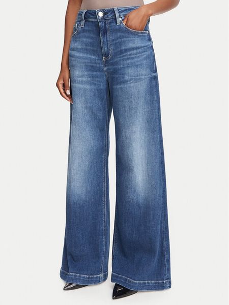 Guess Jeansy W6YAJG D1355 Niebieski Wide Leg. Niebieskie jeansy Guess, z aplikacjami, z bawełny. Za 537,99 zł.