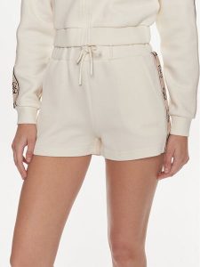 Guess Szorty sportowe Britney V3GD13 KB3P2 Écru Loose Fit. Spodenki sportowe Guess, l, z aplikacjami, z bawełny. Za 229,99 zł.