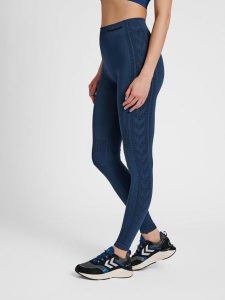 Damskie legginsy mid-rise Hummel Shaping. Niebieskie legginsy Hummel, bez wzorów, z dzianiny. Za 213,00 zł.