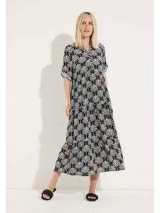 More & More Sukienka w kolorze biało-czarnym rozmiar: 40. Czarne sukienki More & More, bez wzorów, z wiskozy, bez kołnierzyka, bez ramiączek, midi. Za 354,95 zł.
