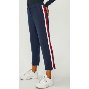 Tommy Jeans - Spodnie. Spodnie z wysokim stanem marki Tommy Jeans. W wyprzedaży za 239,90 zł.