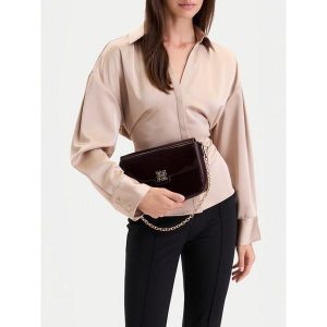 Torebka Nine West. Czerwone torebki wieczorowe Nine West, bez wzorów, bez dodatków. Za 179,99 zł.