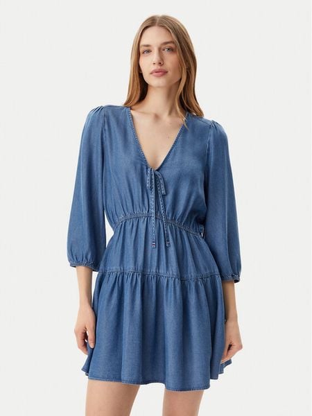 Tommy Jeans Sukienka codzienna DW0DW20612 Niebieski Relaxed Fit. Niebieskie kombinezony Tommy Jeans, xl, bez wzorów, z jeansu, bez kołnierzyka, bez ramiączek. Za 299,99 zł.