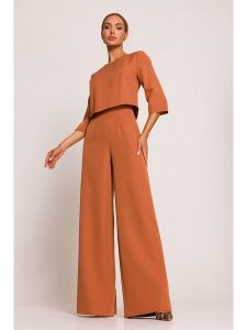 Made of emotion Kombinezon w kolorze pomarańczowym rozmiar: M. Pomarańczowe kombinezony Made Of Emotion, m, bez wzorów, bez kołnierzyka, bez ramiączek. Za 232,78 zł.