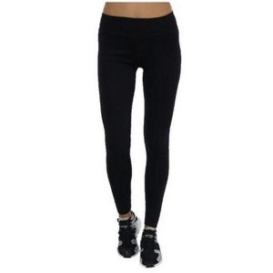 Legginsy Damskie Żakard Engineered. Czarne legginsy Converse, bez wzorów, z materiału, długie. Za 83,05 zł.