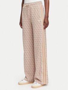 Guess Spodnie dresowe V6YB27 K5181 Beżowy Relaxed Fit. Brązowe spodnie dresowe Guess, s, z aplikacjami, z dresówki. Za 474,99 zł.