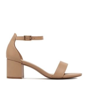 Sandały JENNY. Brązowe sandały Jenny, bez wzorów, bez obcasa, na słupku, bez zapięcia. Za 119,99 zł.