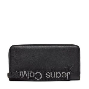 Portfel Calvin Klein. Czarne portfele Calvin Klein, bez wzorów. Za 159,99 zł.