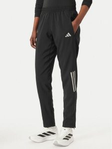 Adidas Spodnie dresowe Astro KC4947 Czarny Regular Fit. Czarne spodnie dresowe ADIDAS, xs, bez wzorów, z dresówki. Za 299,99 zł.