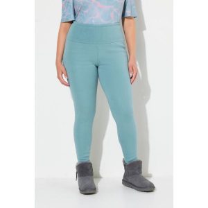 Damskie Legginsy sztuczne futerko od wewnątrz bardzo ciepłe wysoki stan. Zielone legginsy Ulla Popken, bez wzorów, z bawełny, z podwyższonym stanem. Za 294,99 zł.