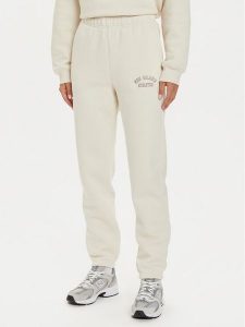 New Balance Spodnie dresowe WP43500 Beżowy Relaxed Fit. Brązowe spodnie dresowe New Balance, s, bez wzorów, z bawełny. Za 209,99 zł.