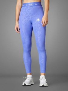 Adidas Legginsy sportowe w kolorze fioletowym rozmiar: XS. Różowe legginsy sportowe ADIDAS, xs, bez wzorów, z materiału, outdoorowe, climacool (adidas). Za 96,37 zł.