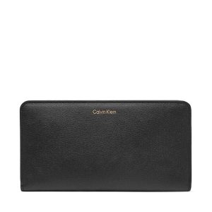 Portfel Calvin Klein. Czarne portfele Calvin Klein, bez wzorów. Za 289,99 zł.