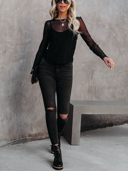 Milan Kiss Bluzka w kolorze czarnym rozmiar: M. Czarne bluzki Milan Kiss, m, bez wzorów, bez kołnierzyka, bez ramiączek. Za 152,62 zł.