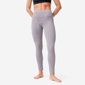 Legginsy do jogi i pilatesu Domyos. Fioletowe legginsy DOMYOS, bez wzorów, z elastanu. Za 119,99 zł.
