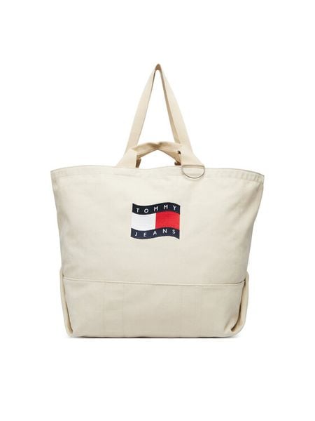 Tommy Jeans Torebka Tjw Wave Flag Med Tote AW0AW18466 Beżowy. Brązowe shopper bag Tommy Jeans, bez wzorów, z jeansu, bez dodatków. Za 409,99 zł.