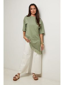Le Monde du Lin Tunika w kolorze zielonym rozmiar: 34/36. Zielone tuniki Le Monde du Lin, bez wzorów, z bawełny, z asymetrycznym kołnierzem, bez ramiączek. Za 100,99 zł.