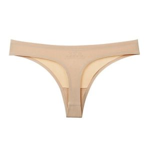 Stringi bezszwowe niewidoczne pod odzieżą Trayanka. Czerwona stringi Intica, bez wzorów, z materiału. Za 49,00 zł.